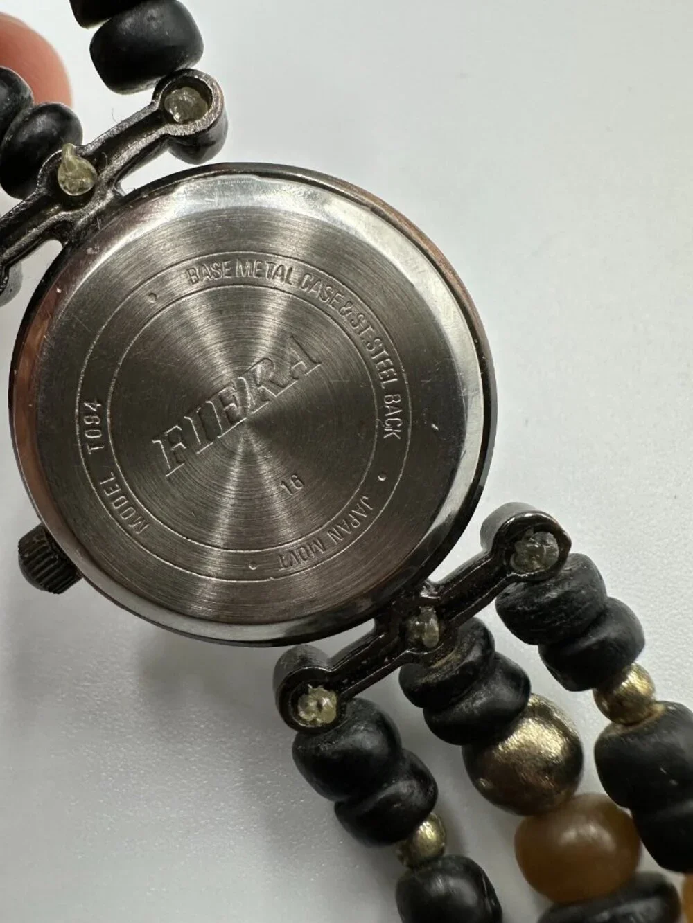 3/$30 Fiera Watch Women Brass Tone Black Beaded Wooden Band New Battery 6.5”
